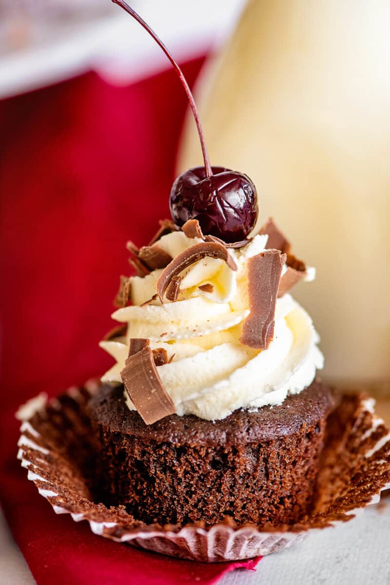 unwrapped black forest cupcakes with chocolate and cherry