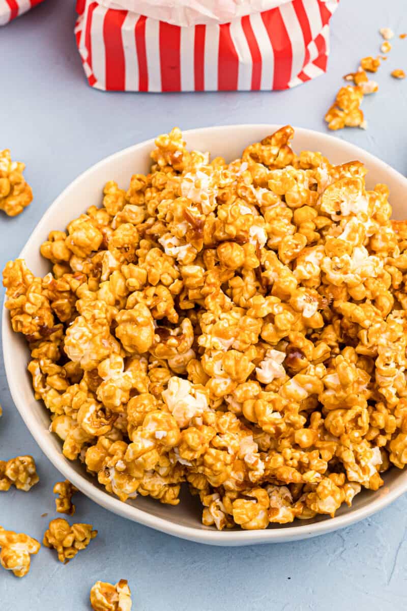 caramel popcorn in white bowl