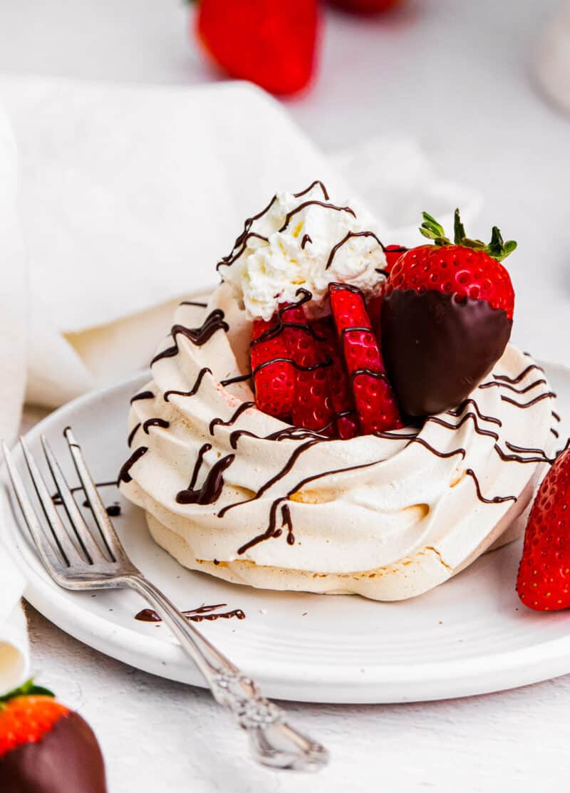 chocolate covered strawberry pavlova on plate