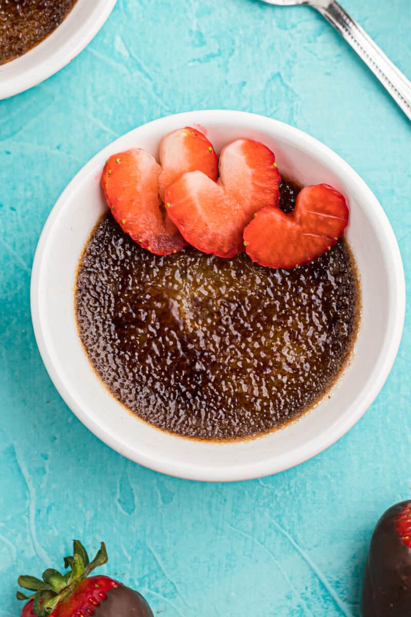 chocolate creme brulee with strawberry hearts