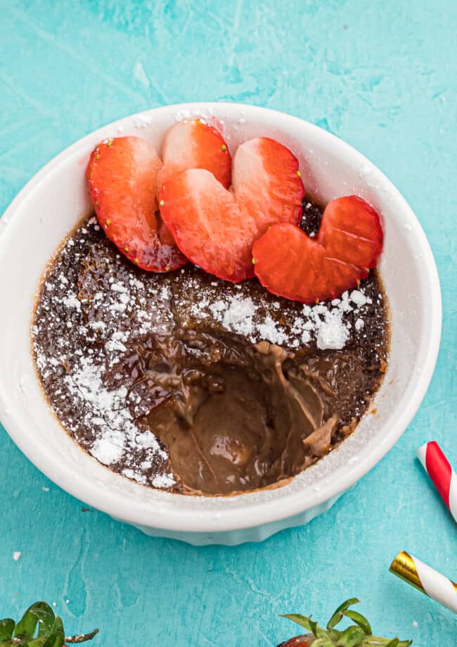 chocolate creme brulee with strawberries and powdered sugar