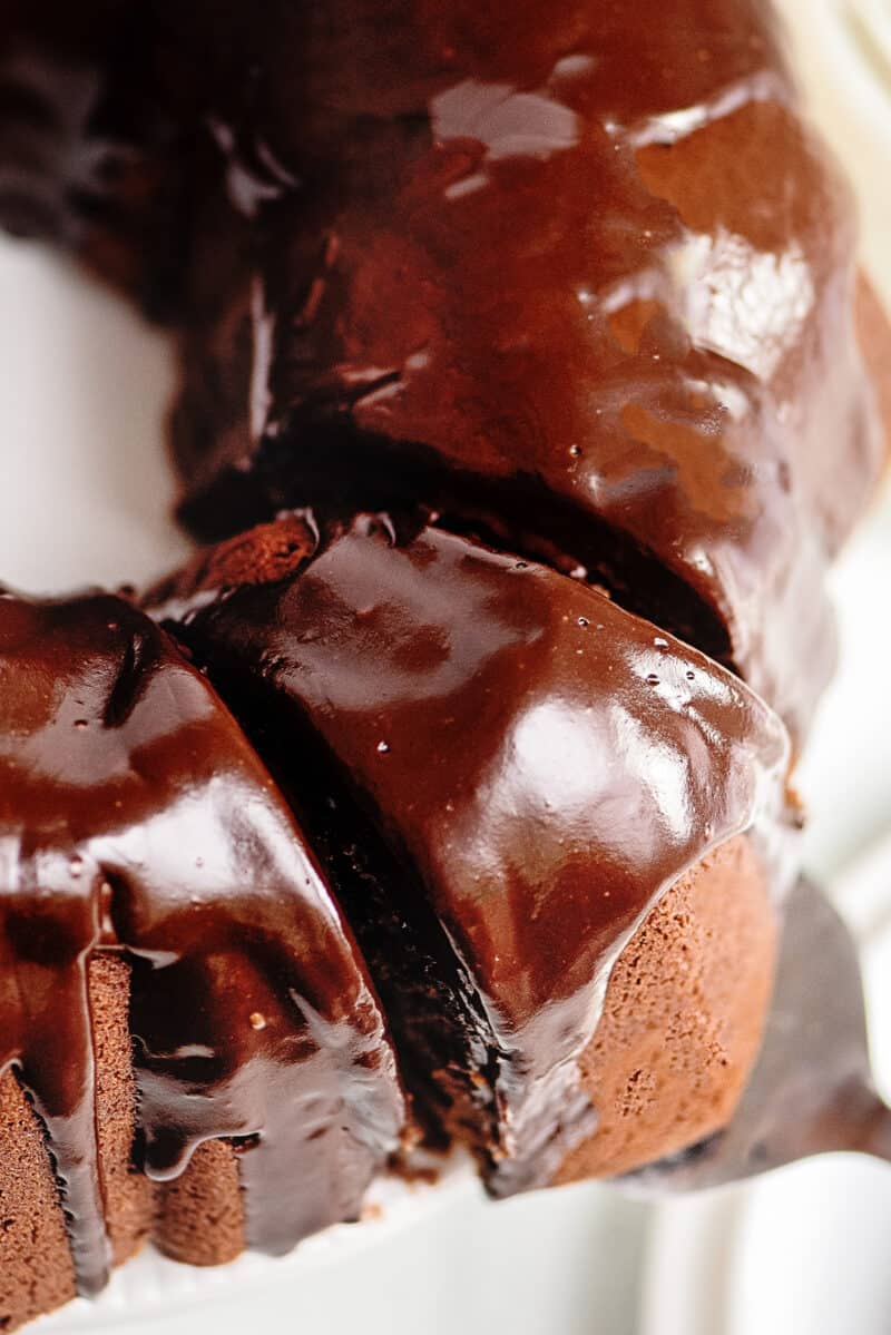 up close slice of iced chocolate pound cake