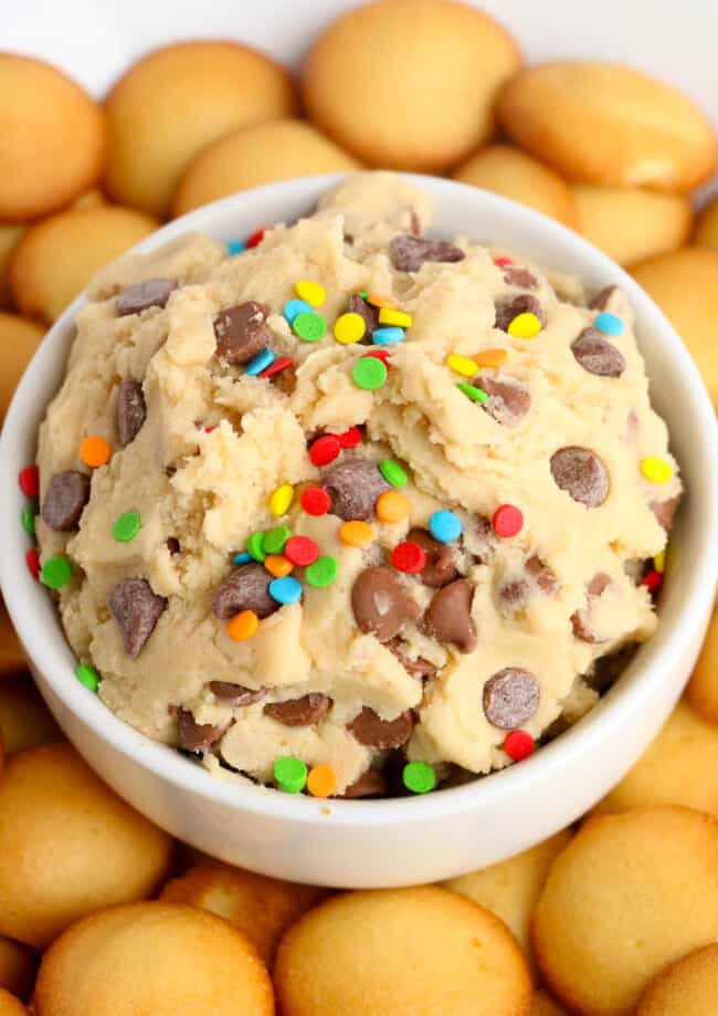 edible cookie dough dip in white bowl with vanilla wafers