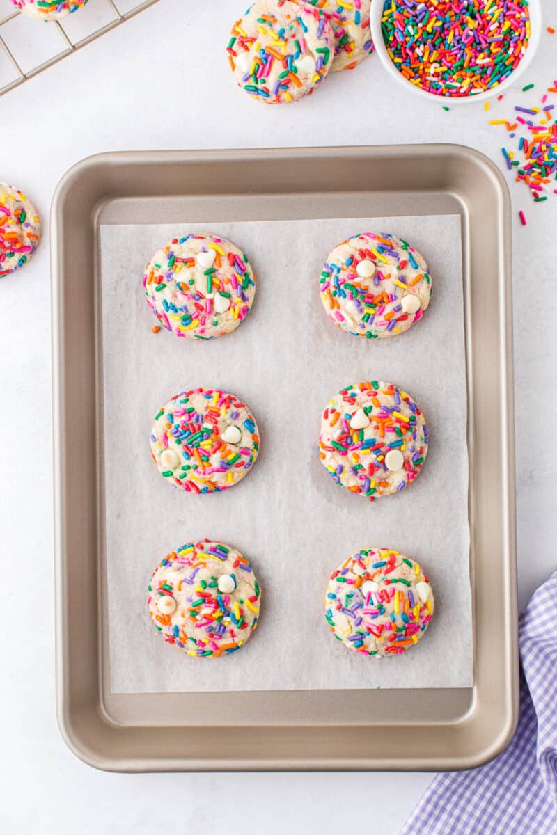 funfetti cookies with white chocolate chips on baking sheet