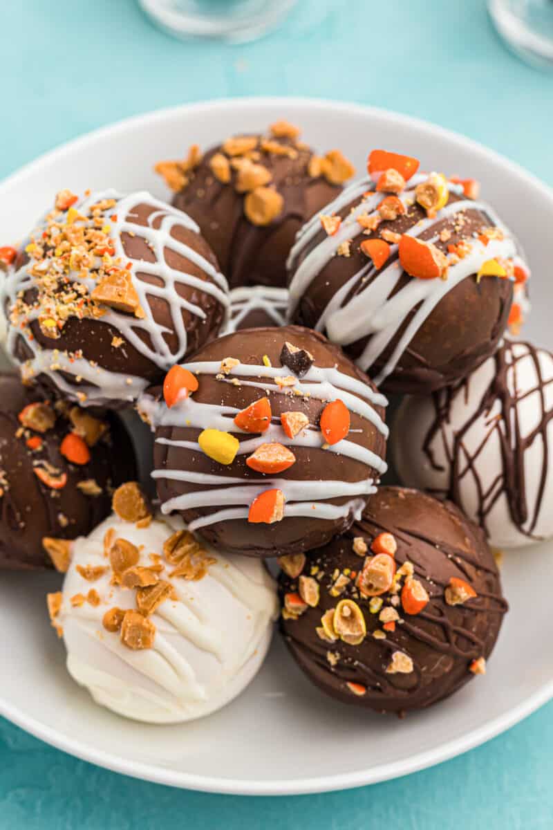hot cocoa bombs with candy pieces on plate