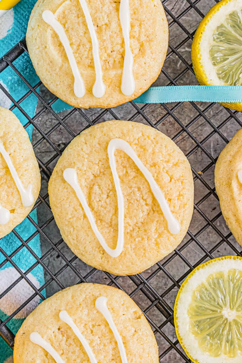 up close drizzled lemon cookies on cooling rack