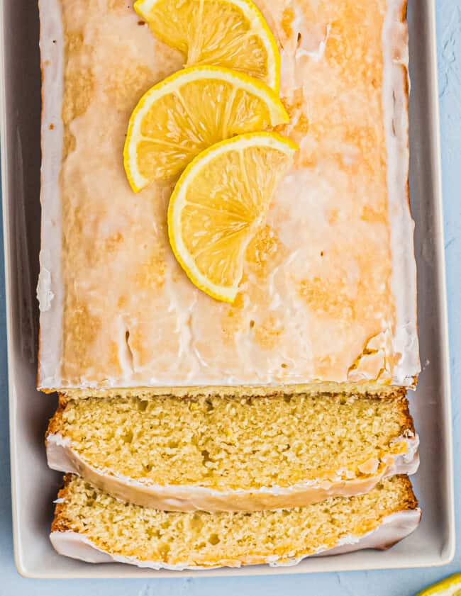 glazed lemon pound cake with two slices