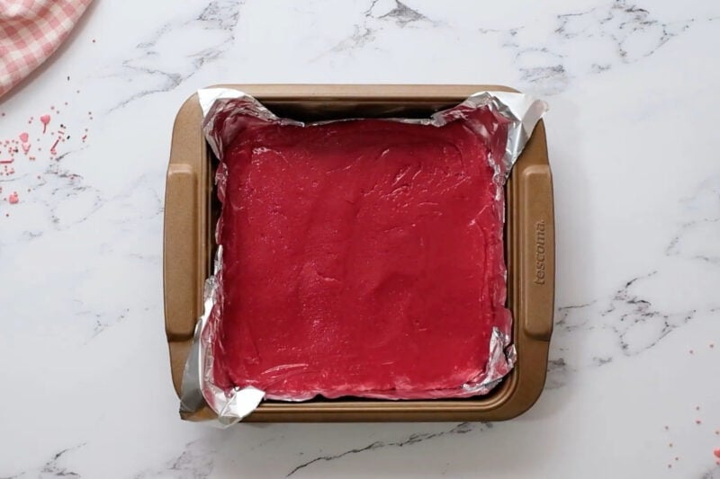red velvet fudge in a foil-lined baking pan.