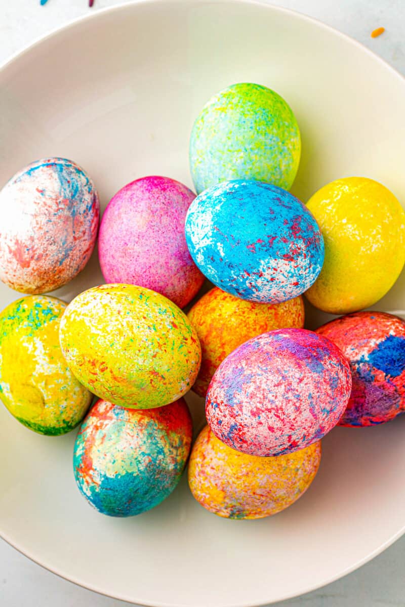 overhead rice dyed easter eggs in many colors in bowl