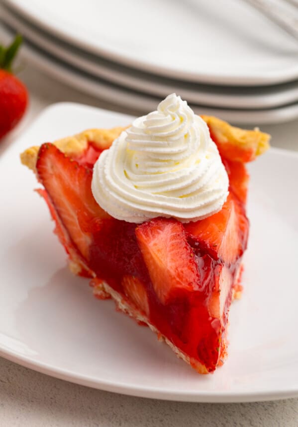 slice of strawberry jello pie with whipped cream