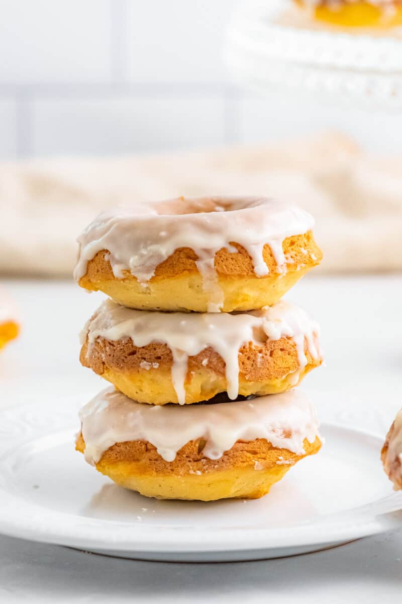 stacked glazed donuts that are baked
