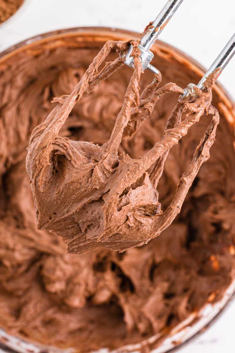 mixer with chocolate buttercream frosting