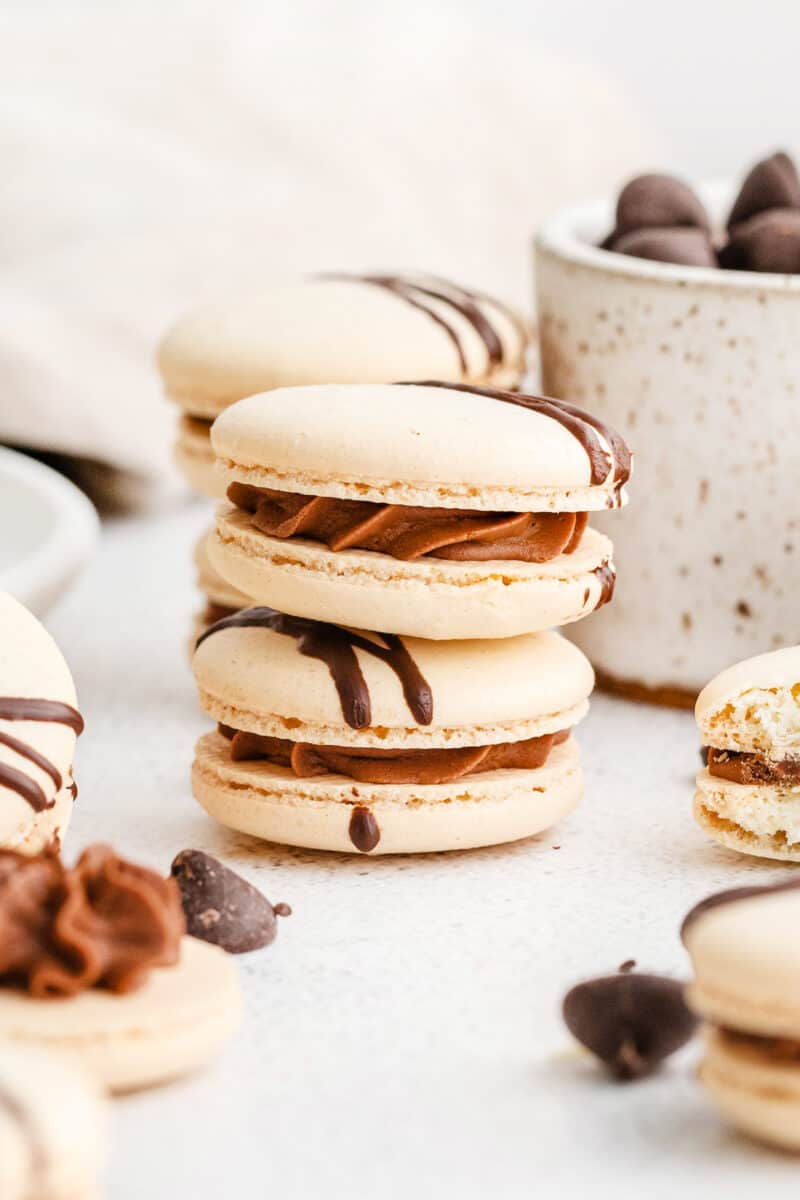 two stacked chocolate macarons