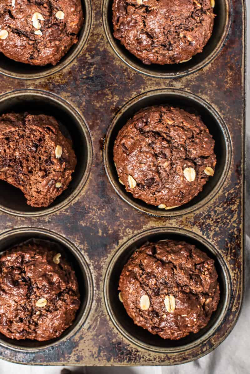 up close chocolate oatmeal muffins in muffin tin
