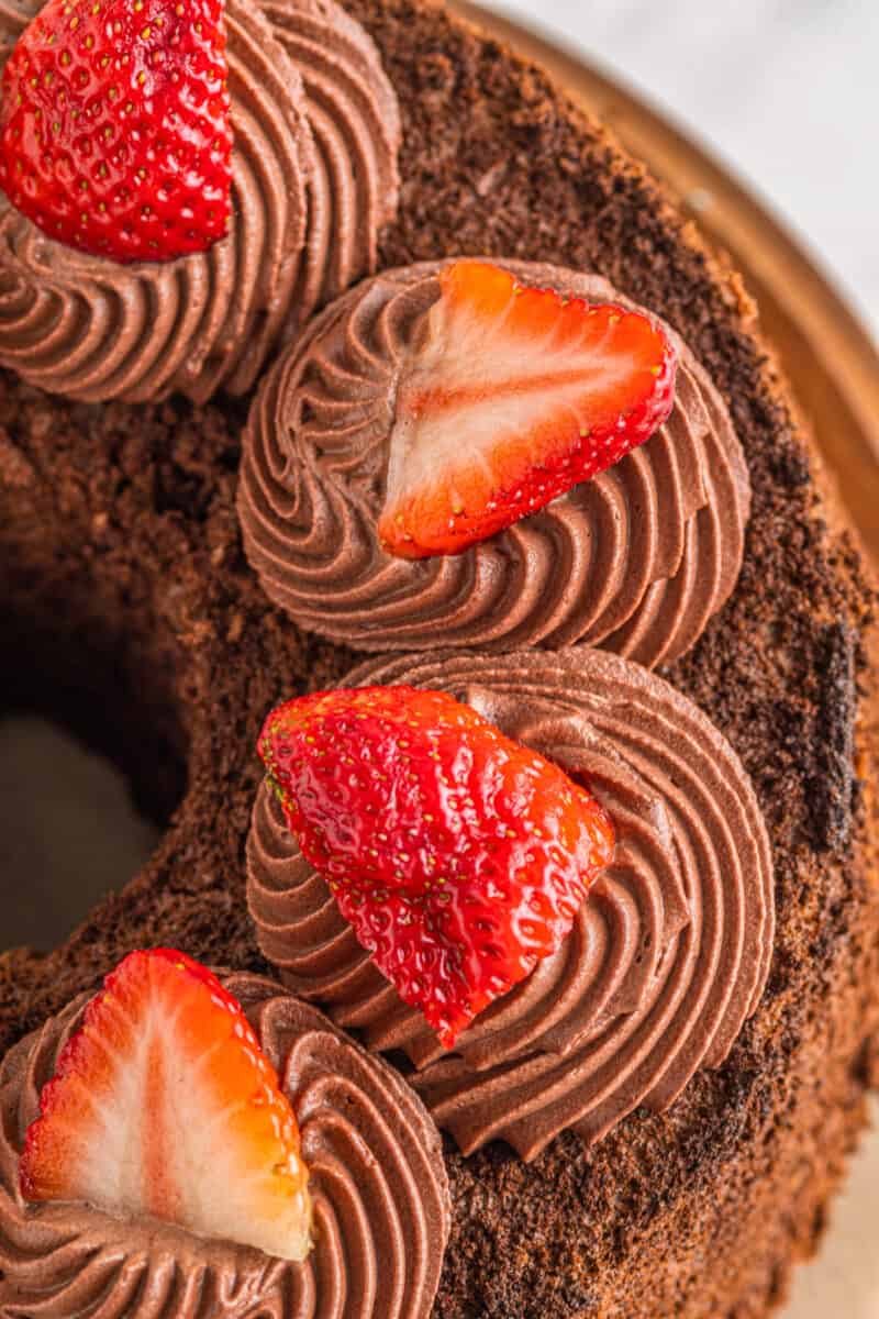 up close image of chocolate whipped cream frosting on cake