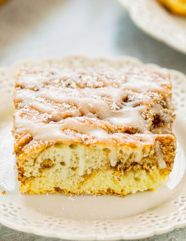 up close cinnamon roll cake with icing