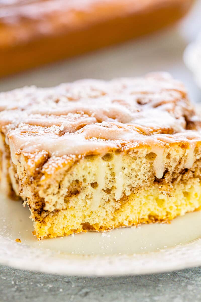 up close cinnamon roll cake with icing