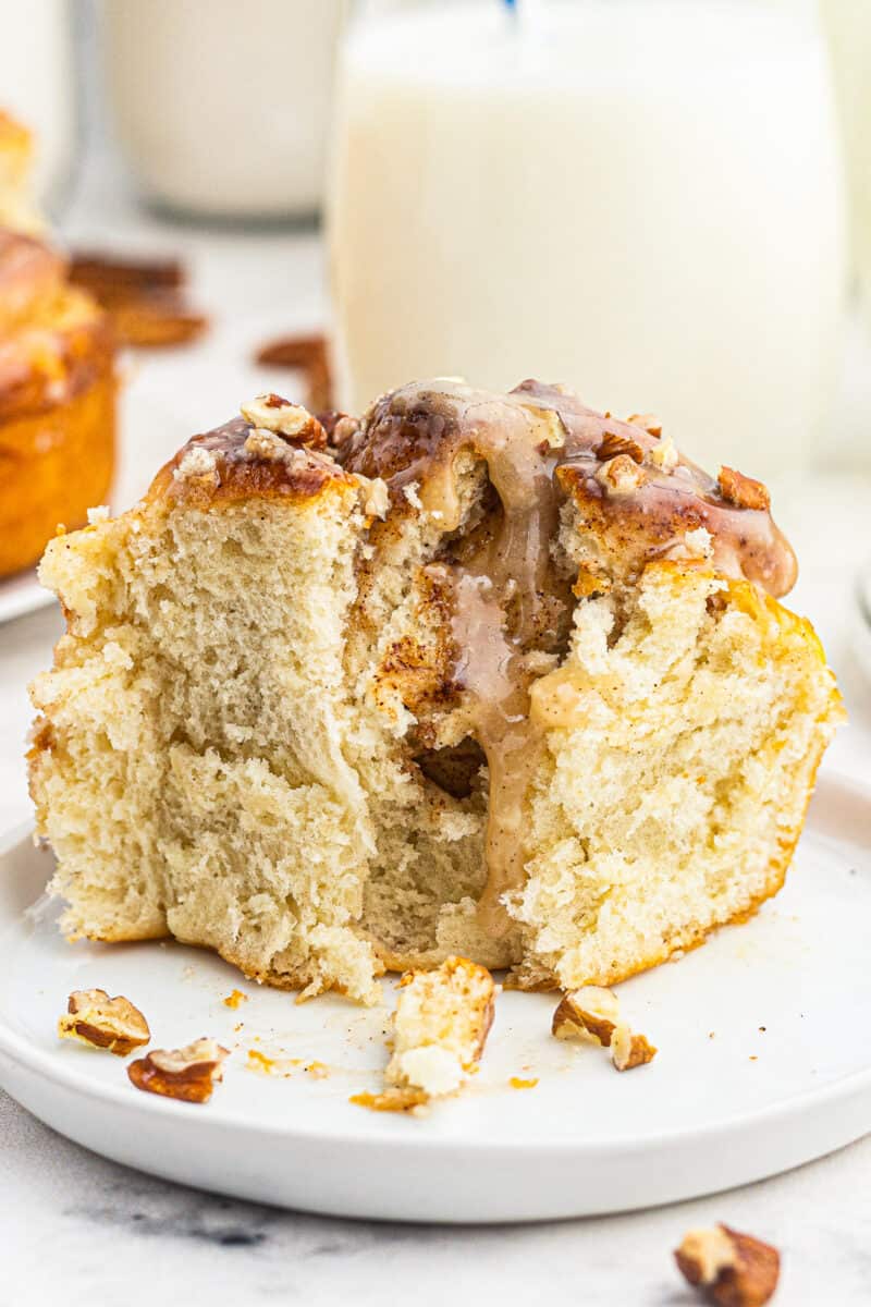 inside of cinnamon roll drizzled with cream cheese glaze