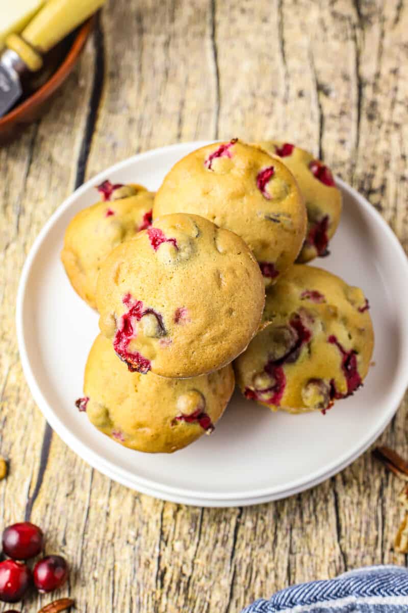 cranberry pecan muffins on white plate