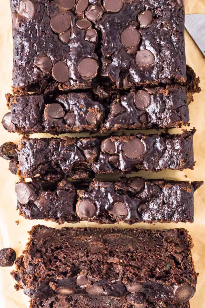 up close overhead sliced chocolate zucchini bread with chocolate chips