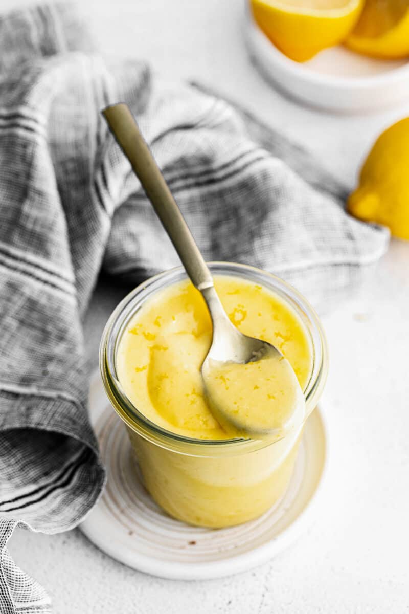 lemon curd recipe in glass jar with spoon
