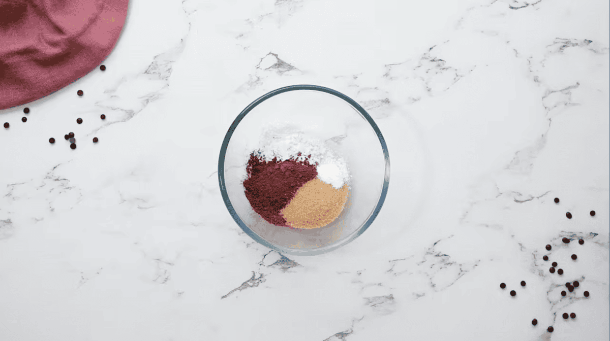 dry ingredients for chocolate mug cake in a glass bowl.