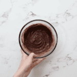 chocolate mug cake batter in a glass bowl.
