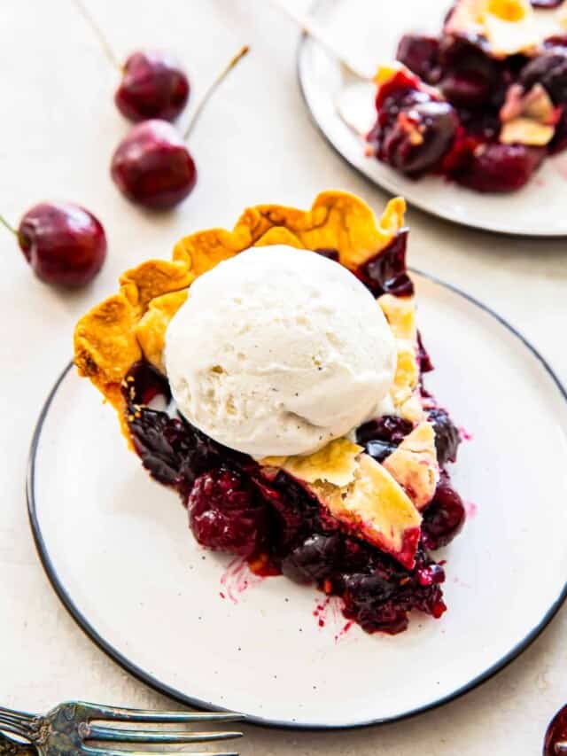 slice of cherry pie with vanilla ice cream