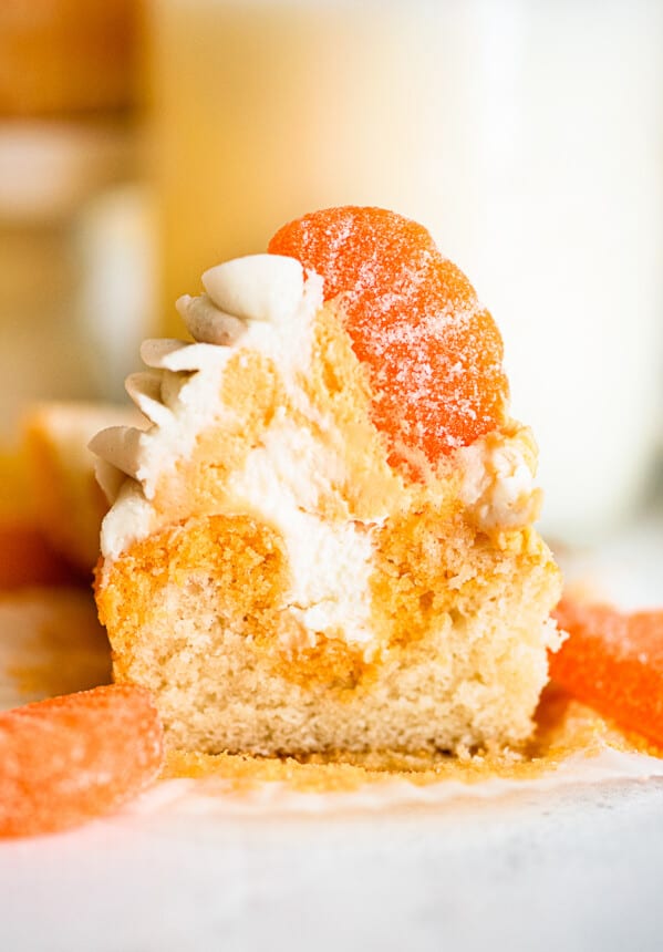 stuffed orange creamsicle cupcake cut in half