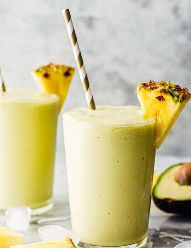 pineapple avocado smoothie recipe garnished with fresh pineapple