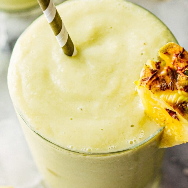 pineapple avocado smoothie recipe garnished with fresh pineapple