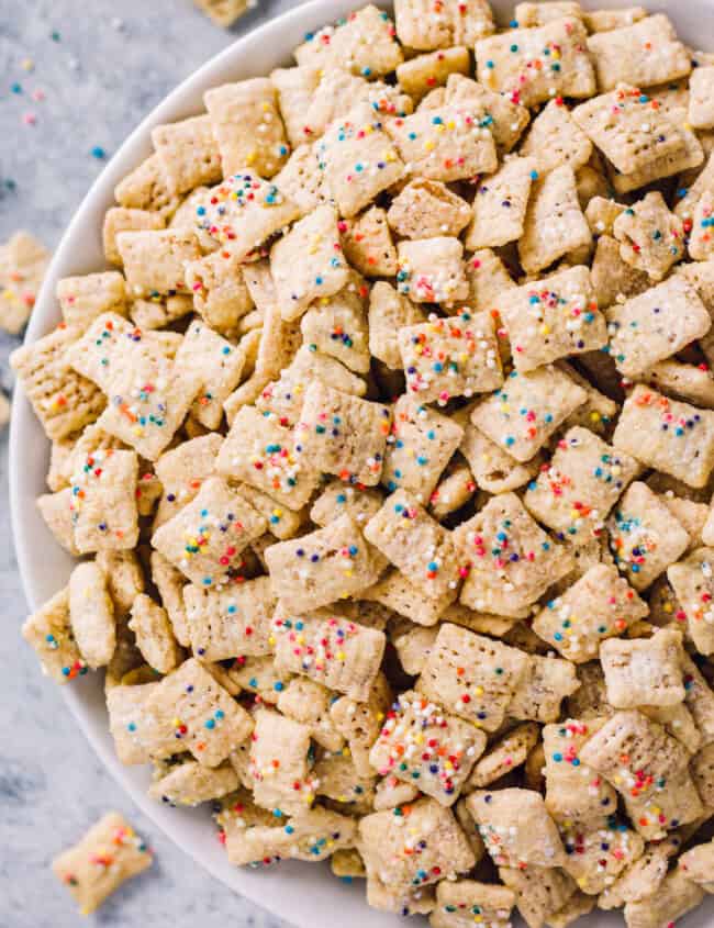 cake batter puppy chow in white bowl