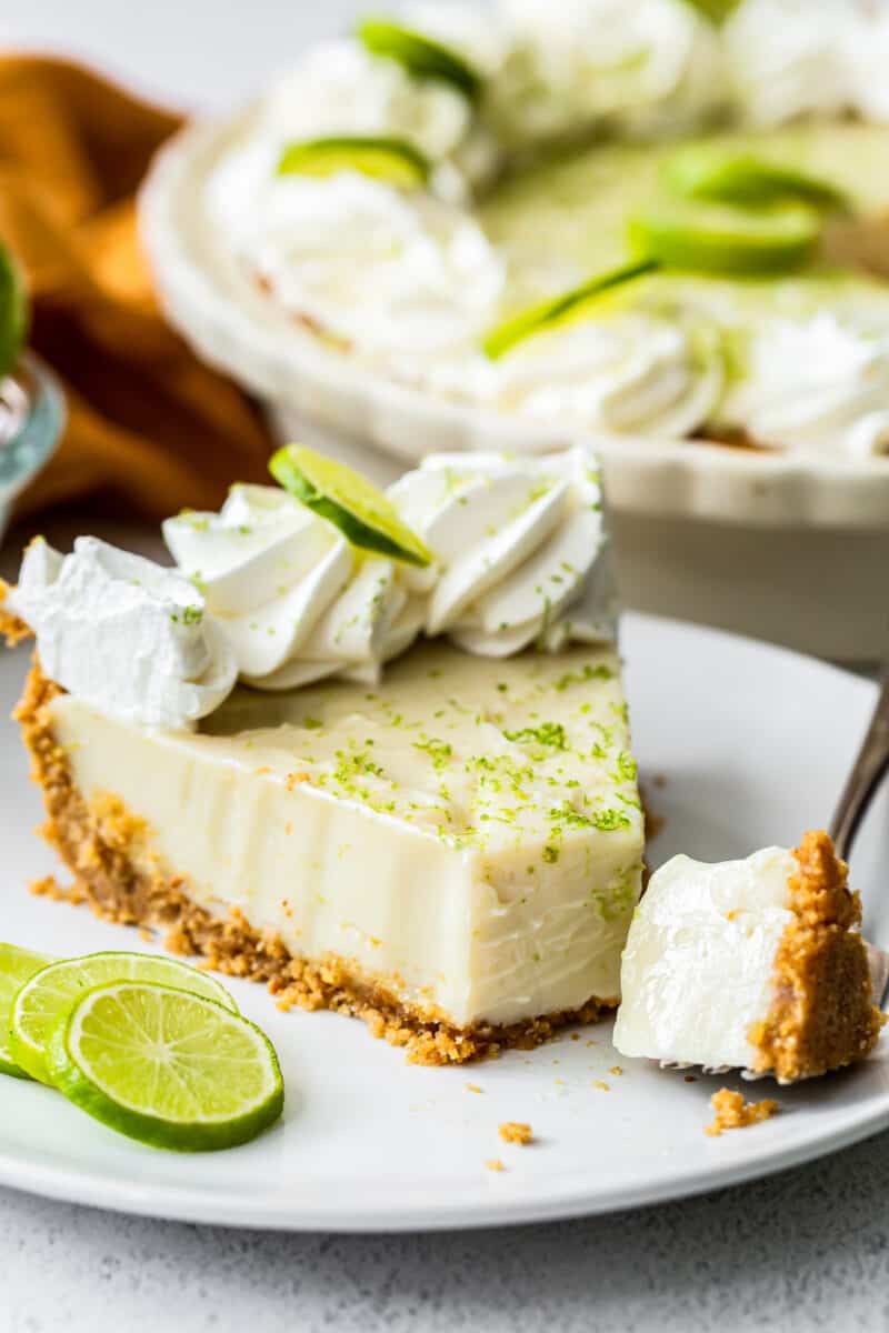 slice of key lime pie with bite out