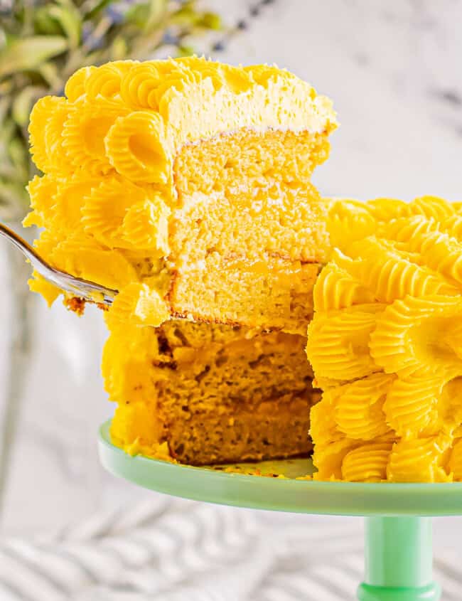 slice out of layered mango cake