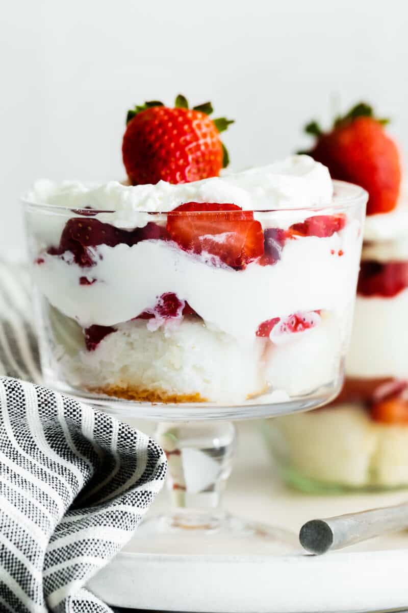up close strawberry shortcake trifles in glass dishes