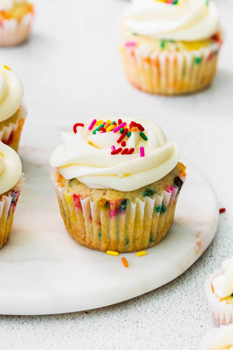 frosted funfetti cupcakes with sprinkles
