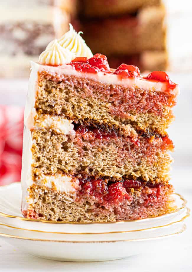 up close slice of strawberry layer cake