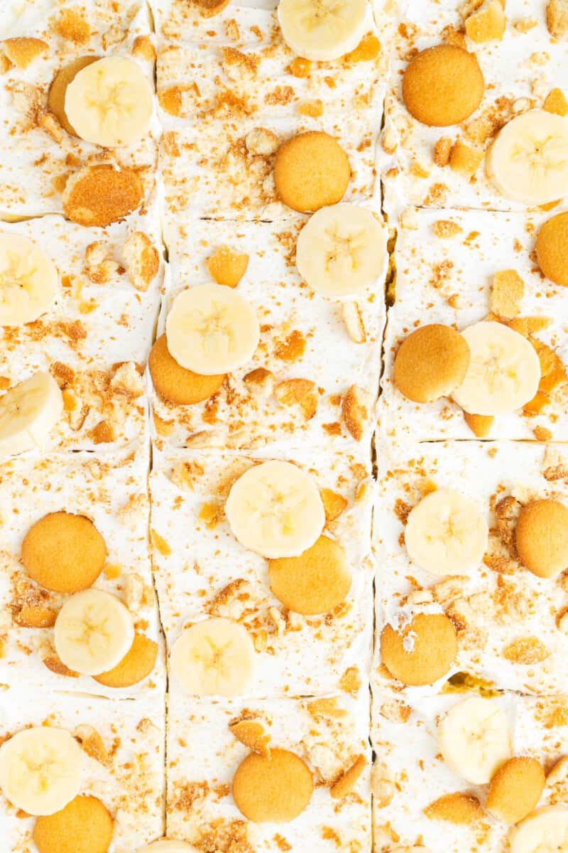 overhead image of banana cream pie poke cake sliced into squares