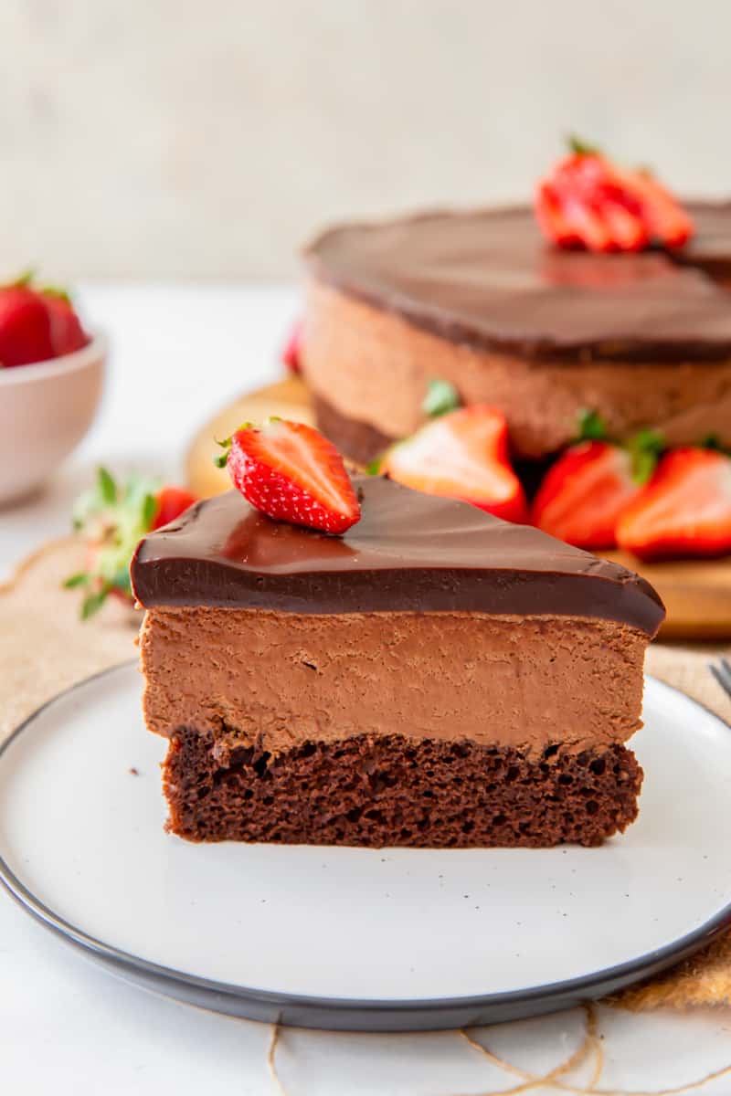 slice of chocolate mousse cake on a white plate
