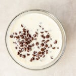 heavy cream and chocolate chips in a glass bowl