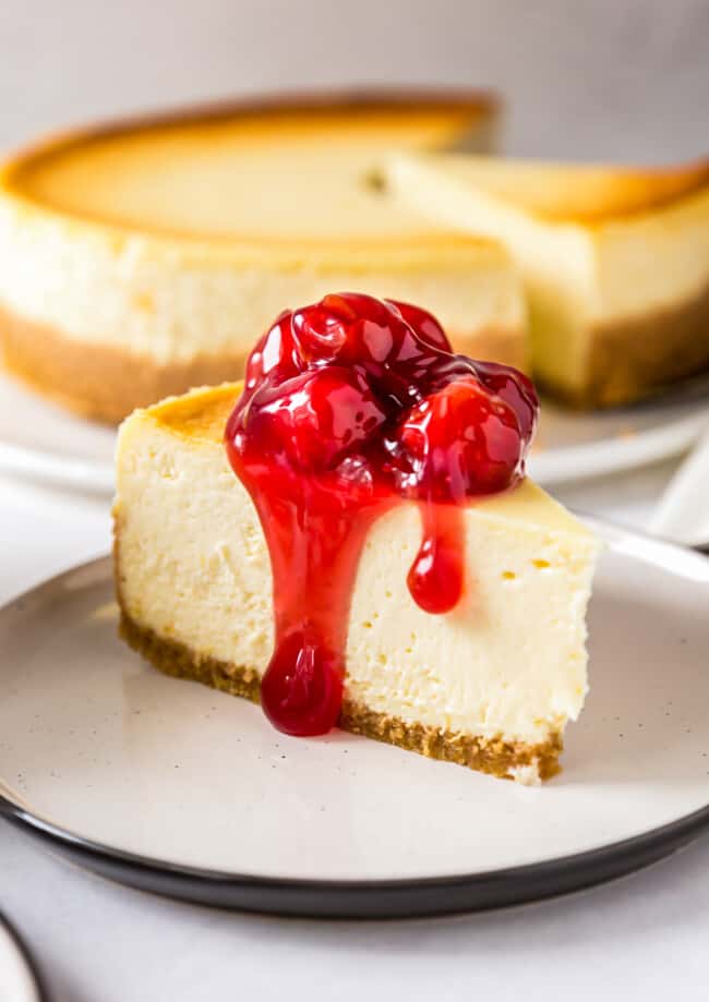 new york cheesecake topped with cherries