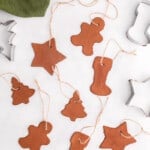 cinnamon ornaments with strings ready to hand