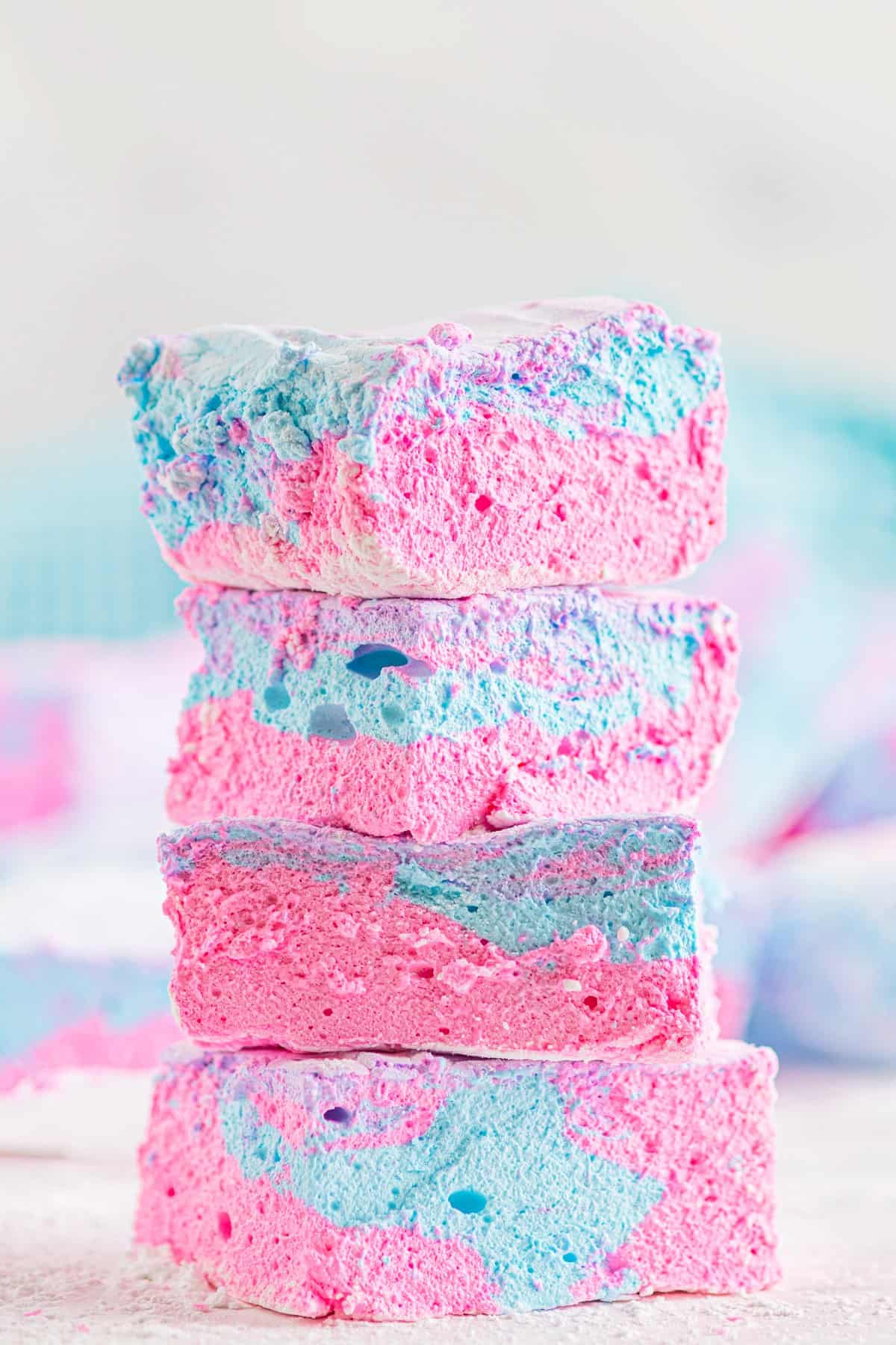 4 cotton candy marshmallows stacked.