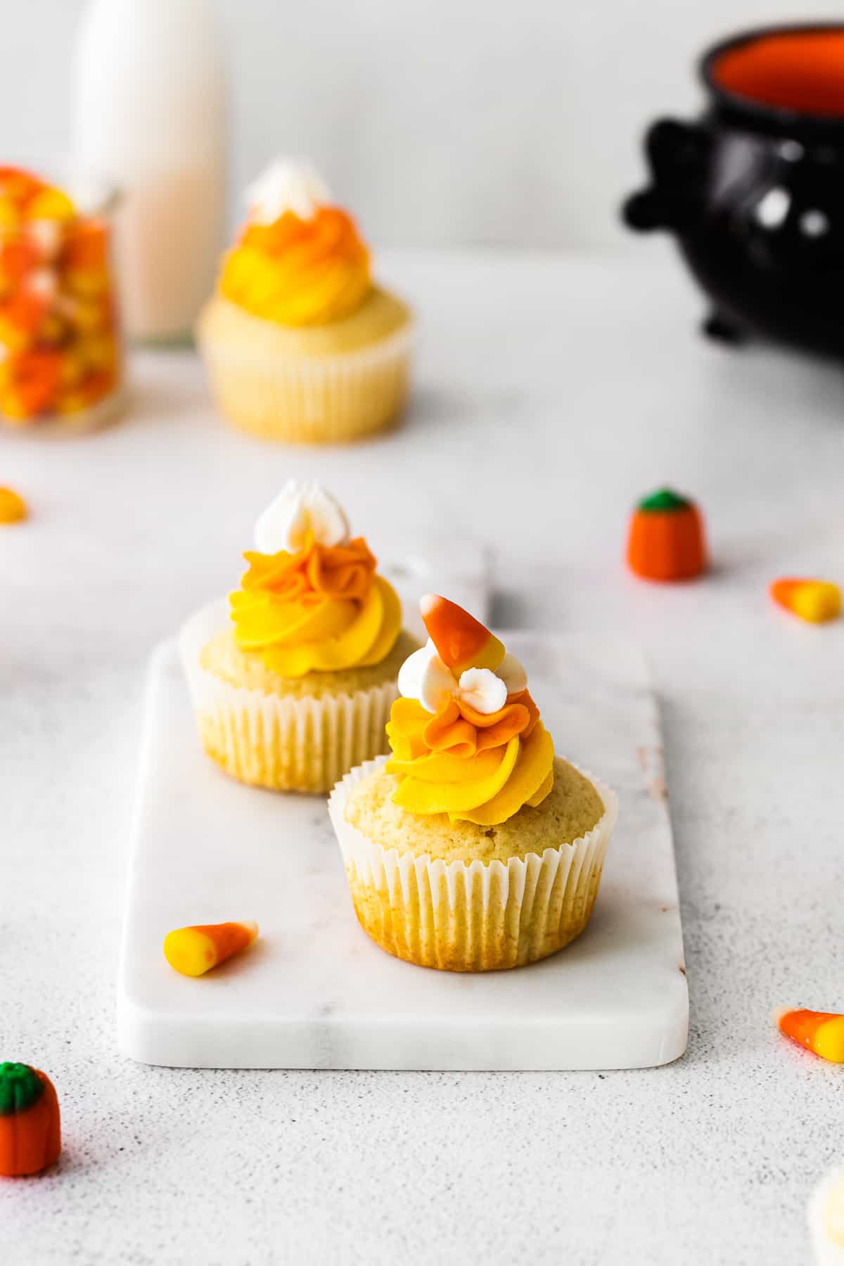 candy corn cupcakes on marble tray