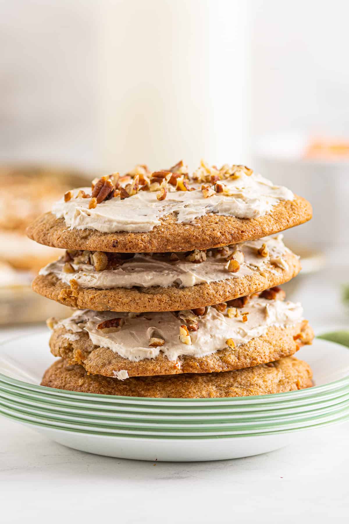stacked frosted carrot cake cookies