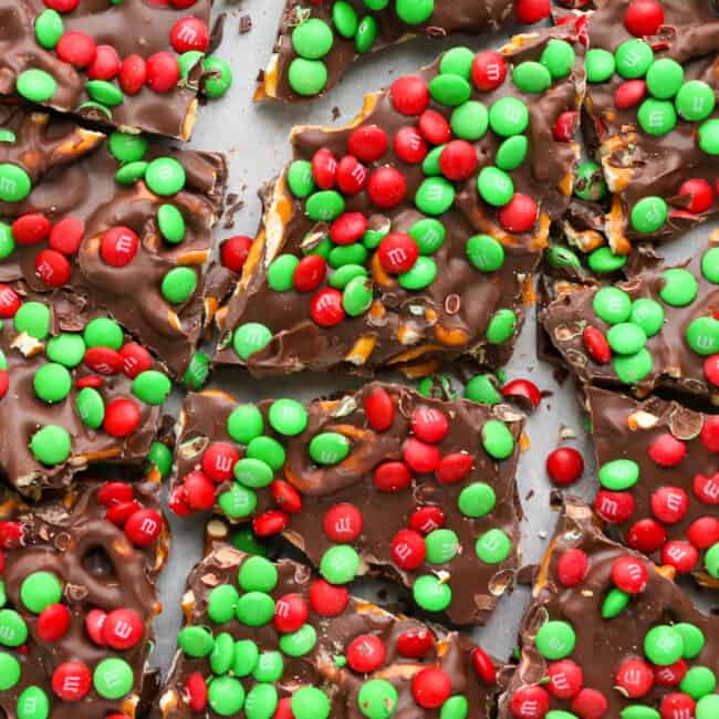 up close m&m chocolate pretzel bark on cookie sheet