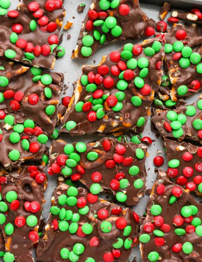 up close m&m chocolate pretzel bark on cookie sheet