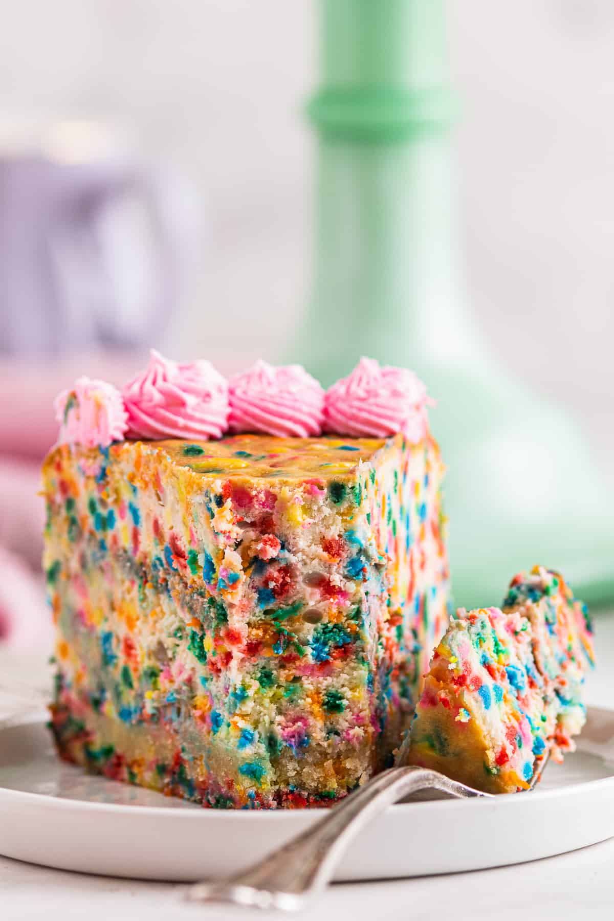 funfetti cheesecake with bite out