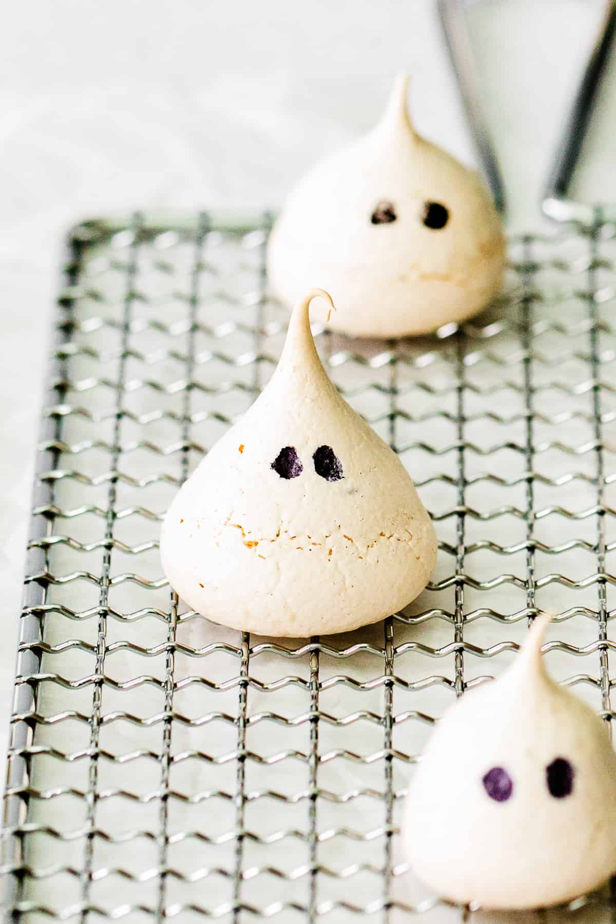 up close ghost meringue cookies