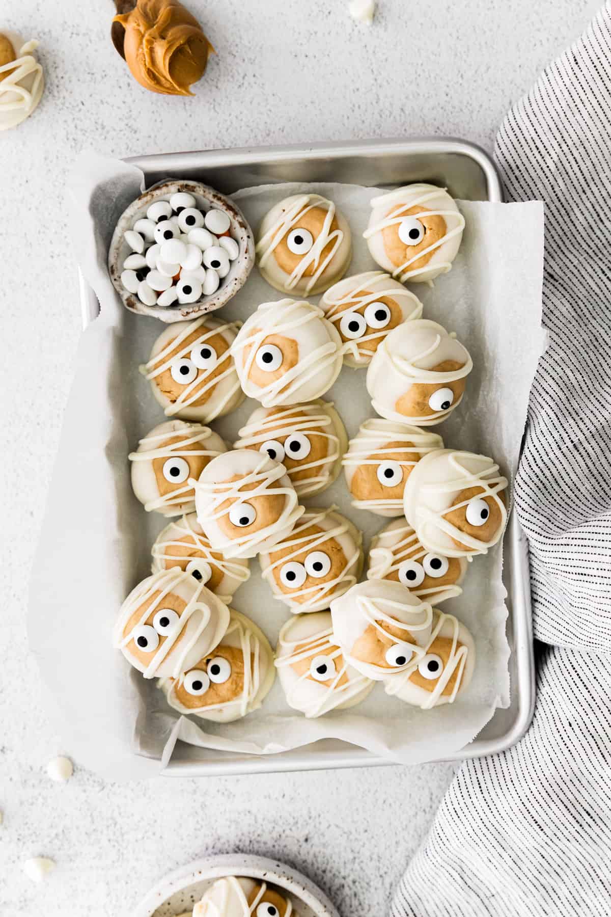 silver tray with white chocolate halloween buckeyes